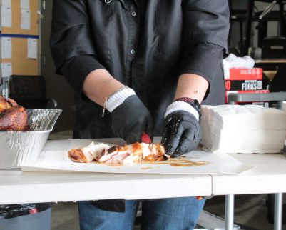 Turkey breast being sliced
