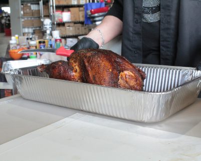 smoked turkey in a foil pan