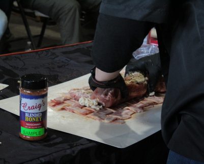 seasoning a bacon wrapped pork loin with craigs blended honey