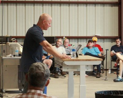 man presenting at outdoor chef cooking class