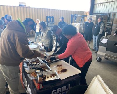 steak class participants filling plates